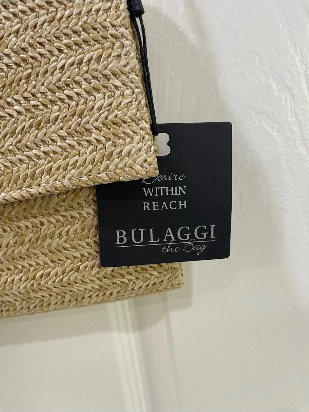 Bulaggi Natural Straw Crossbody Bag with Colorful Toucan Patch